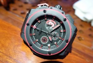 The 48 mm fake Hublot King Power 701.CI.1123.GR watches have black dials with red elements.